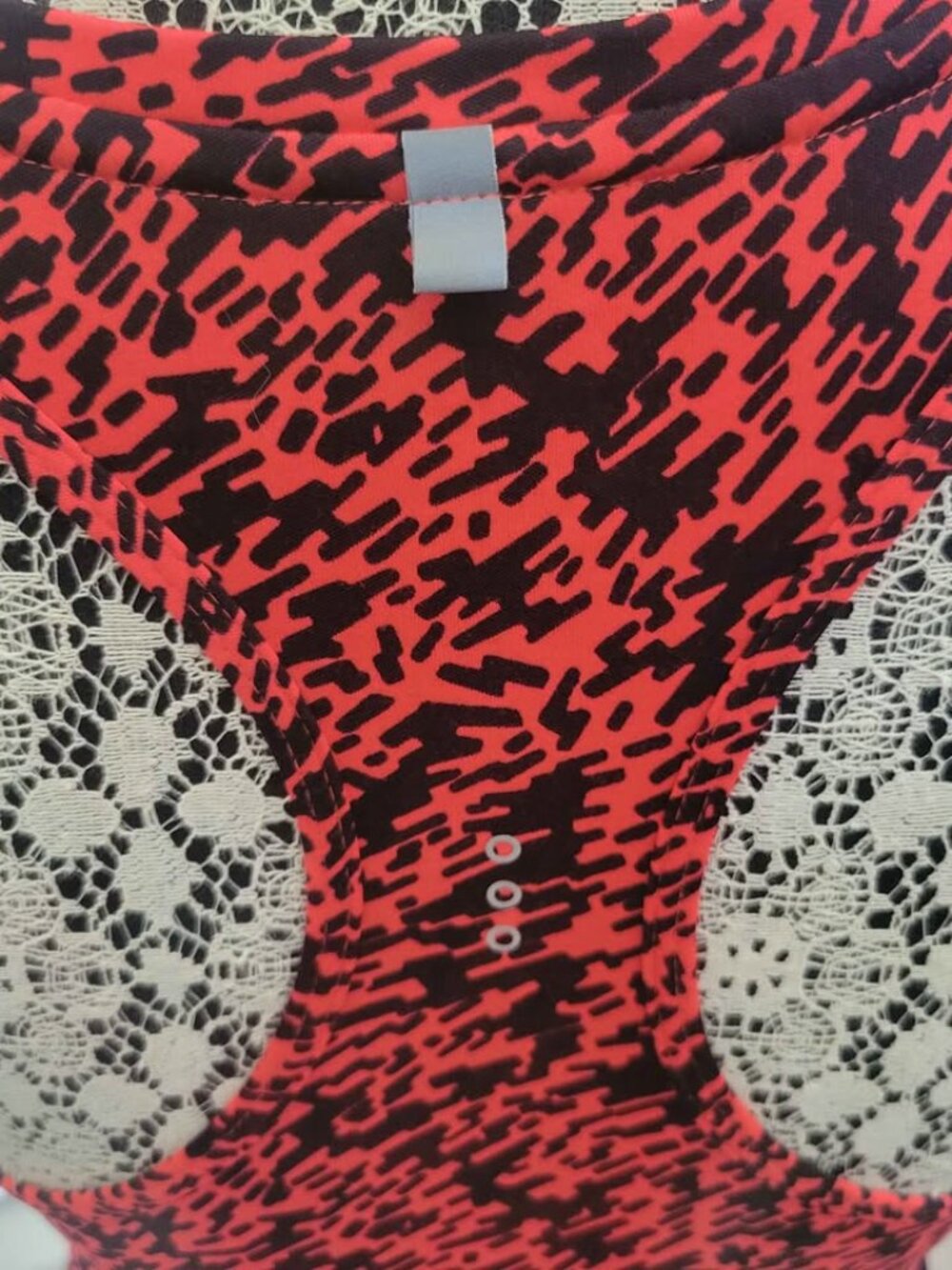 Nike Dri-Fit Racerback Running Tank Top In A Coral And Black Abstract Pattern - Picture 6 of 8